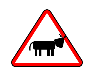 Red-bordered triangle with a black cow silhouette